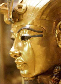 Closeup of the face of the golden inner coffin